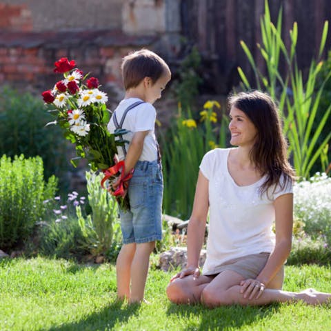 Surprise mom with flowers on Mother’s Day